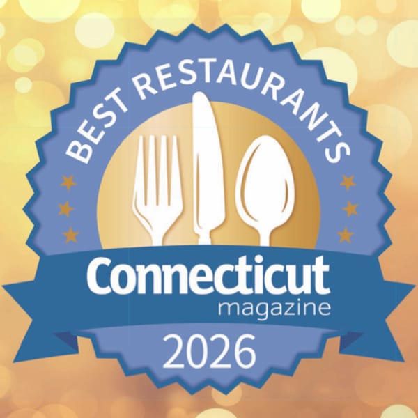 Blue and gold award badge for "Best Restaurants Connecticut Magazine 2026" with cutlery icons.